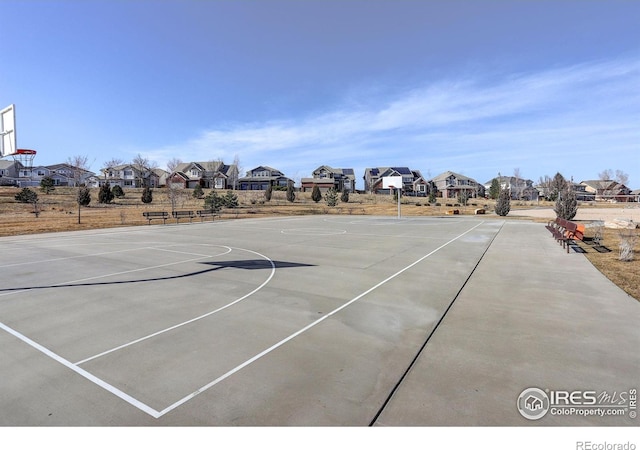 view of sport court with community basketball court and a residential view