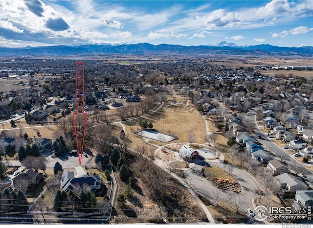 bird's eye view featuring a residential view and a mountain view