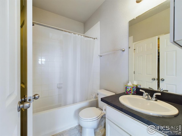 full bathroom featuring shower / tub combo, vanity, and toilet