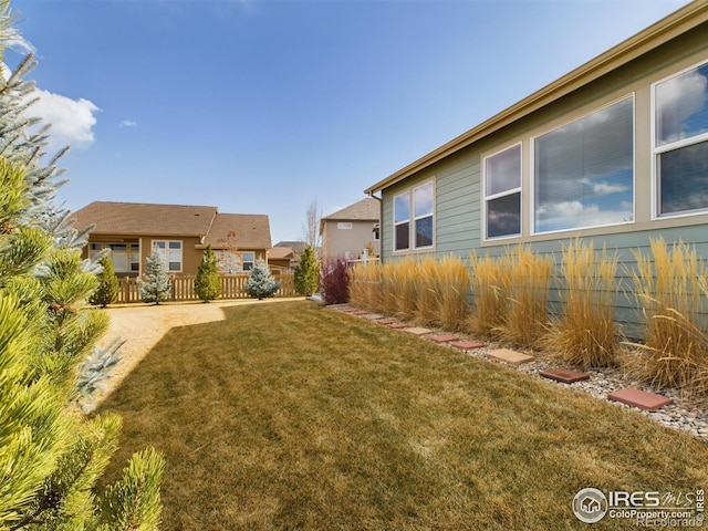 view of yard featuring fence