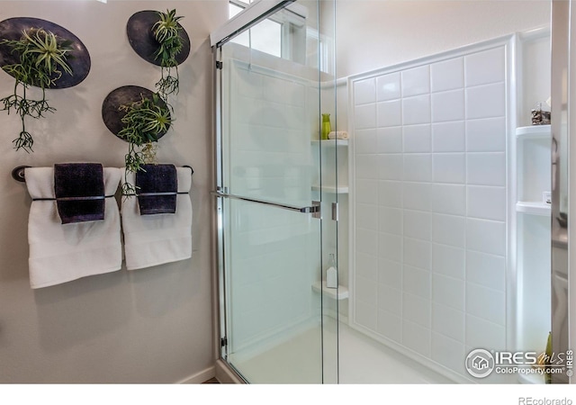 bathroom with a stall shower