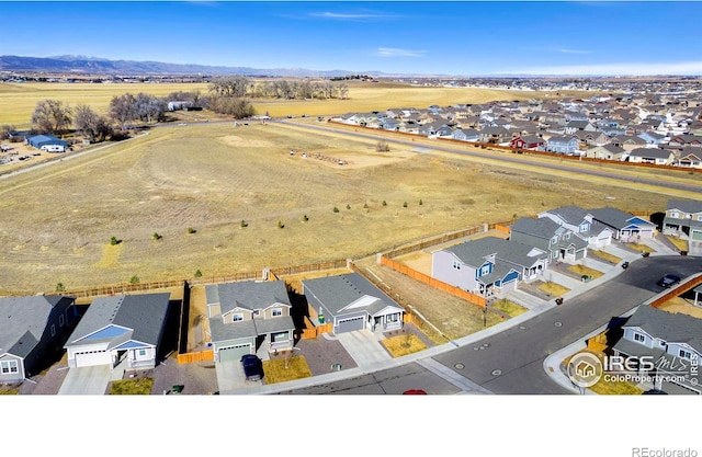 aerial view with a residential view and a mountain view