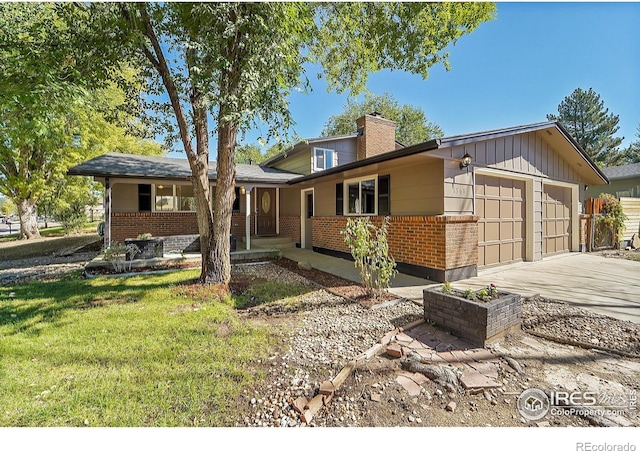 single story home with covered porch, a garage, brick siding, driveway, and a chimney