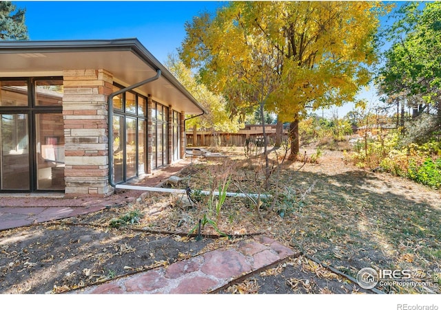 view of yard featuring fence