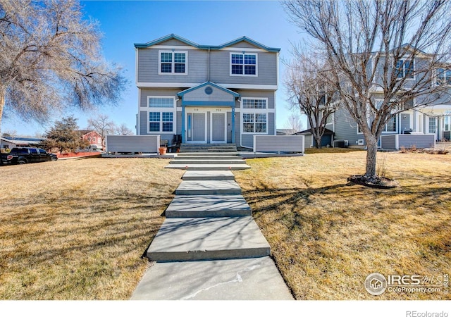 view of front of home with a front lawn