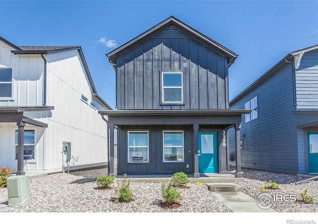 3282 Crusader St, Fort Collins, CO 80524 - view of front of property featuring board and batten siding and covered porch