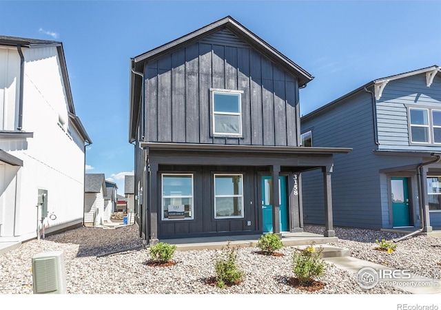 3282 Crusader St, Fort Collins, CO 80524 - view of front of house featuring board and batten siding and covered porch