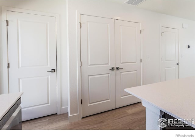 3282 Crusader St, Fort Collins, CO 80524 - laundry room with light wood-style floors
