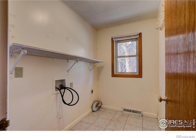 washroom featuring laundry area, light tile patterned floors, visible vents, hookup for a washing machine, and electric dryer hookup