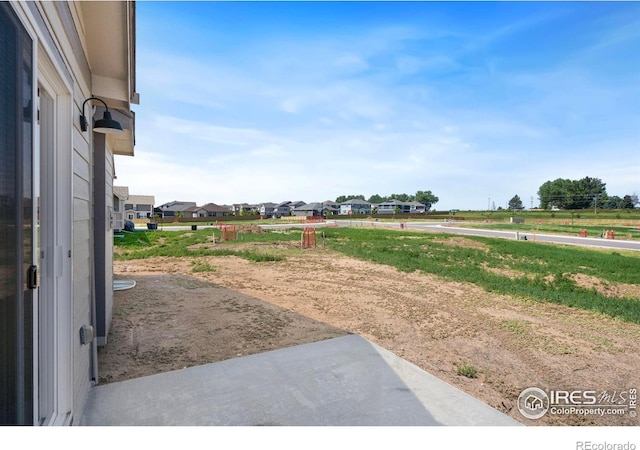 6997 Feather Reed Dr, Wellington, CO 80549 - view of yard featuring a residential view