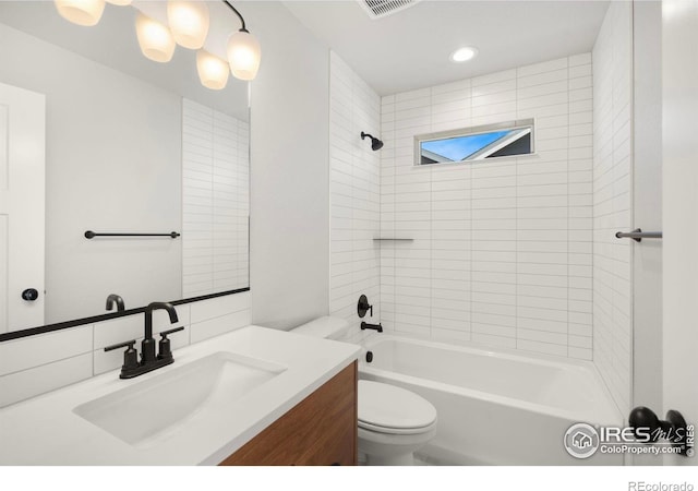 6997 Feather Reed Dr, Wellington, CO 80549 - bathroom with vanity, toilet, shower / bathtub combination, and recessed lighting