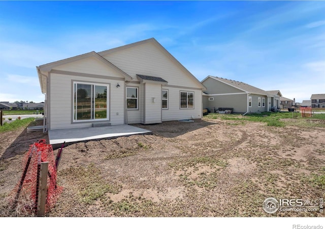 6997 Feather Reed Dr, Wellington, CO 80549 - back of property featuring a patio