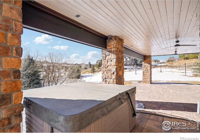 view of patio / terrace featuring a hot tub