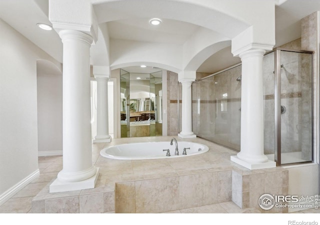 bathroom with a stall shower, tile patterned floors, a garden tub, ornate columns, and recessed lighting