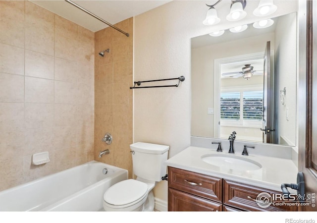 full bathroom featuring a ceiling fan, shower / bath combination, vanity, and toilet