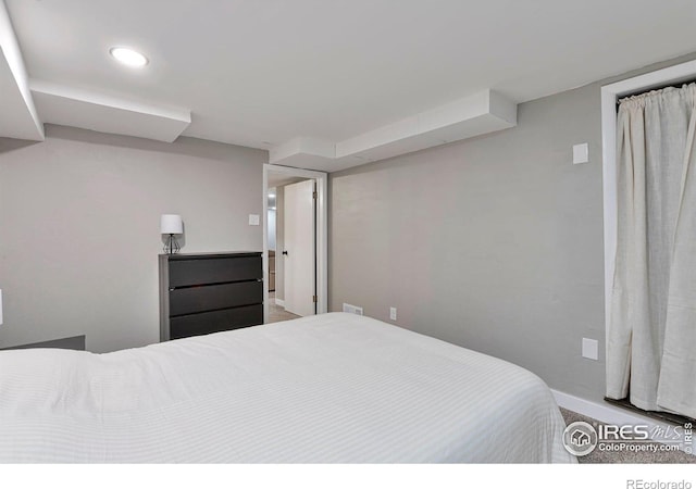 bedroom with baseboards and recessed lighting