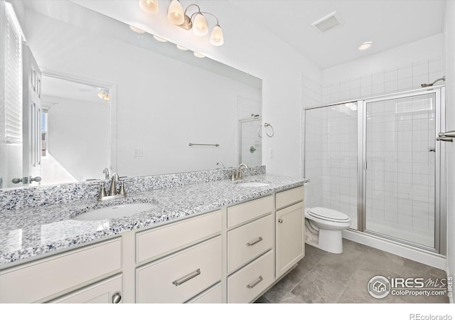 full bathroom with a stall shower, visible vents, and a sink