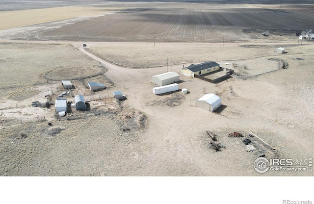 aerial view featuring a desert view