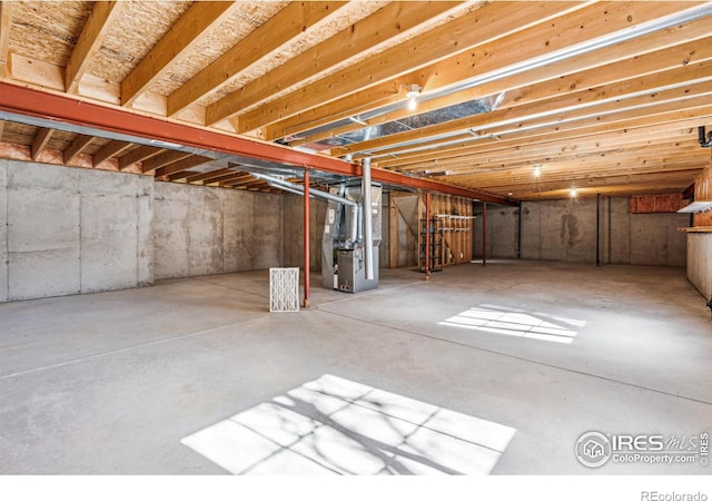 unfinished basement with heating unit