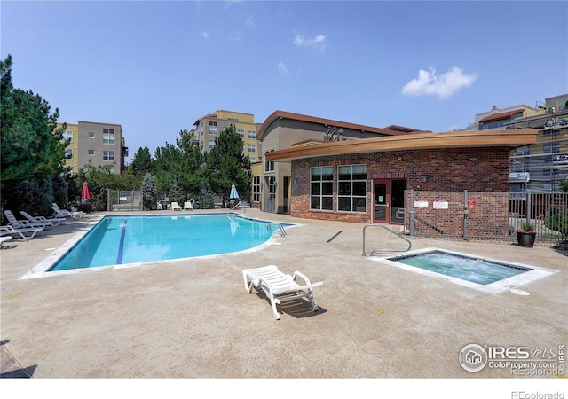 9039 E Panorama Cir Unit 201, Englewood, CO 80112 - community pool with a community hot tub, a patio area, and fence