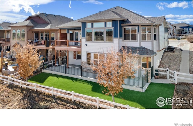 back of property with a patio and a fenced backyard