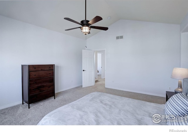 carpeted bedroom featuring vaulted ceiling, a ceiling fan, visible vents, and baseboards