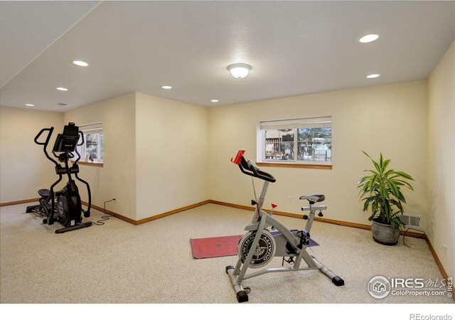 workout area with carpet floors, visible vents, baseboards, and recessed lighting