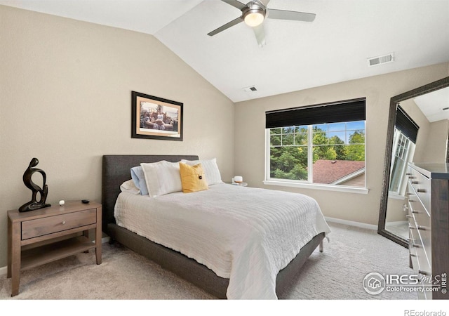 bedroom with lofted ceiling, carpet, visible vents, and baseboards