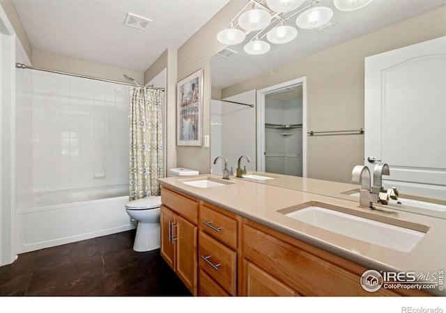 full bathroom featuring visible vents and a sink