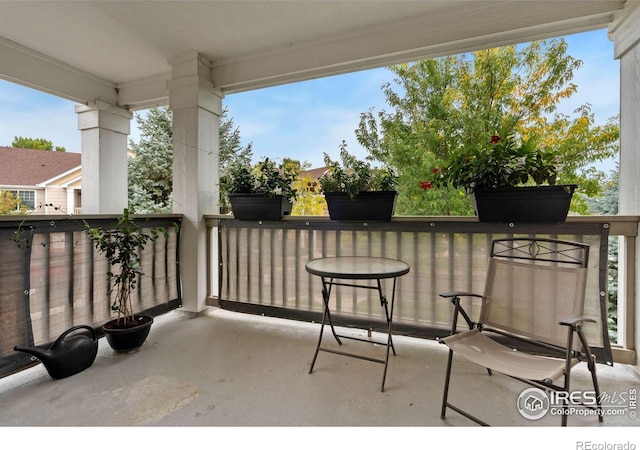 view of patio with a balcony