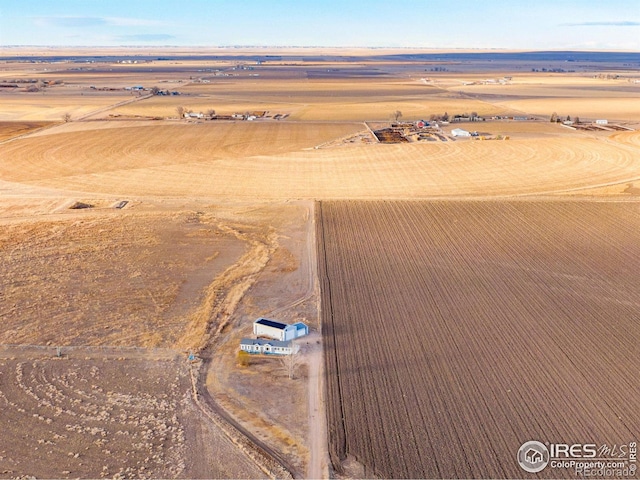 aerial view featuring a rural view and a desert view