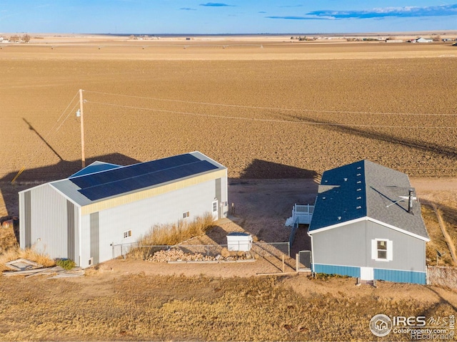 birds eye view of property featuring a rural view