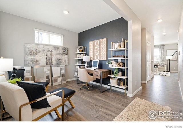 office featuring recessed lighting, baseboards, and wood finished floors