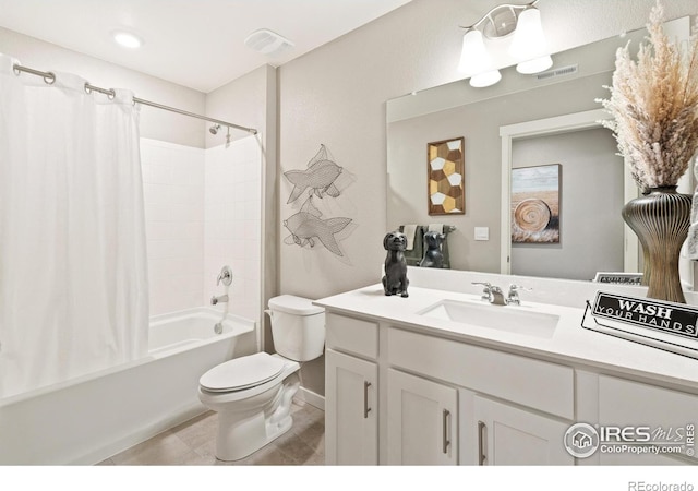 full bath with shower / tub combo with curtain, visible vents, vanity, and toilet
