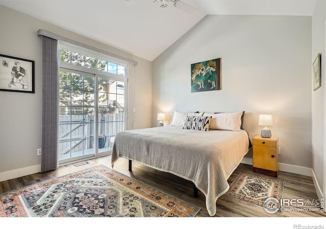 bedroom with lofted ceiling, access to outside, wood finished floors, and baseboards