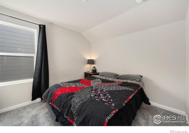 2719 Tallgrass Ln, Berthoud, CO 80513 - carpeted bedroom with lofted ceiling and baseboards