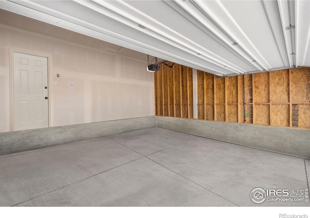 2719 Tallgrass Ln, Berthoud, CO 80513 - garage featuring a garage door opener