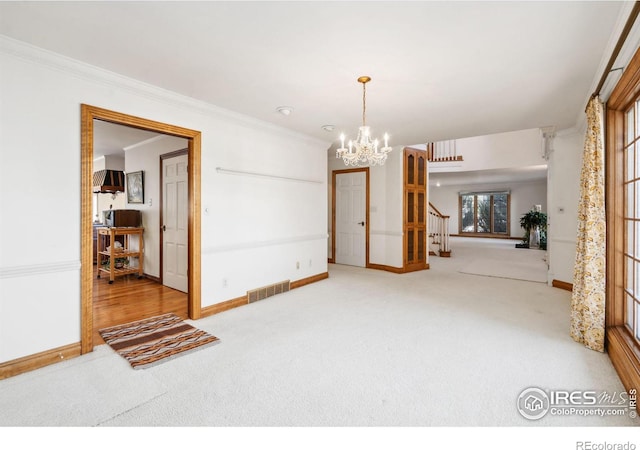 unfurnished dining area featuring stairway, carpet, and an inviting chandelier