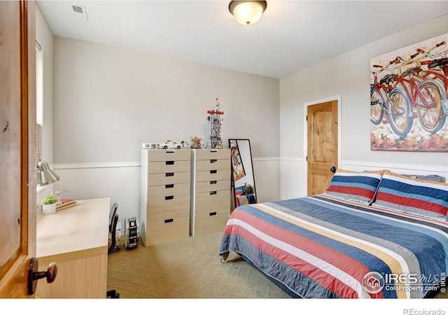 carpeted bedroom with visible vents