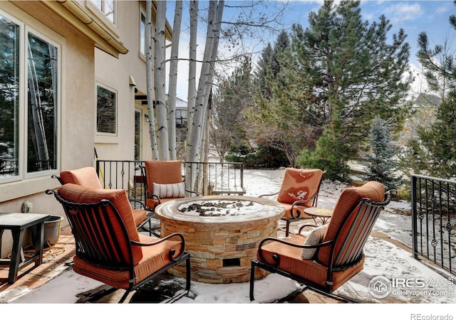 view of patio featuring a fire pit