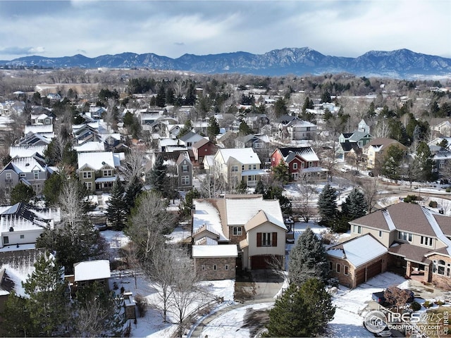 drone / aerial view featuring a residential view and a mountain view