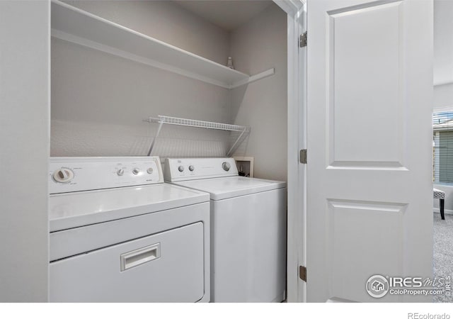 laundry area featuring laundry area and washer and clothes dryer