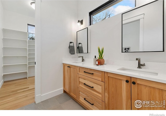 510 Wood St, Fort Collins, CO 80521 - full bathroom featuring baseboards and double vanity