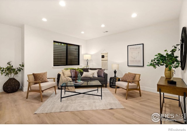 510 Wood St, Fort Collins, CO 80521 - living area featuring light wood-style floors, recessed lighting, and baseboards