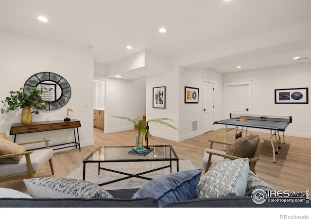 510 Wood St, Fort Collins, CO 80521 - living room featuring baseboards, recessed lighting, and light wood-style flooring