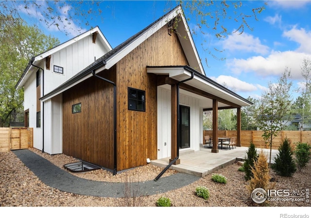510 Wood St, Fort Collins, CO 80521 - back of house with a patio and fence