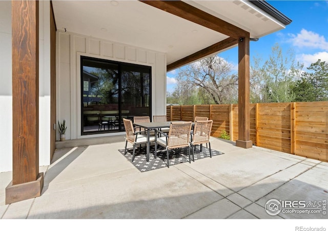 510 Wood St, Fort Collins, CO 80521 - view of patio / terrace with outdoor dining area and fence