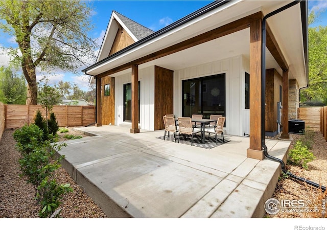 510 Wood St, Fort Collins, CO 80521 - rear view of house with a patio area, outdoor dining space, and a fenced backyard