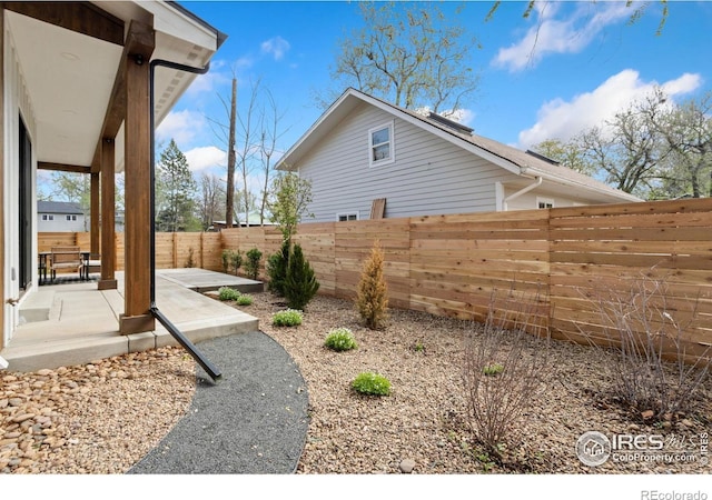 510 Wood St, Fort Collins, CO 80521 - fenced backyard with a patio area
