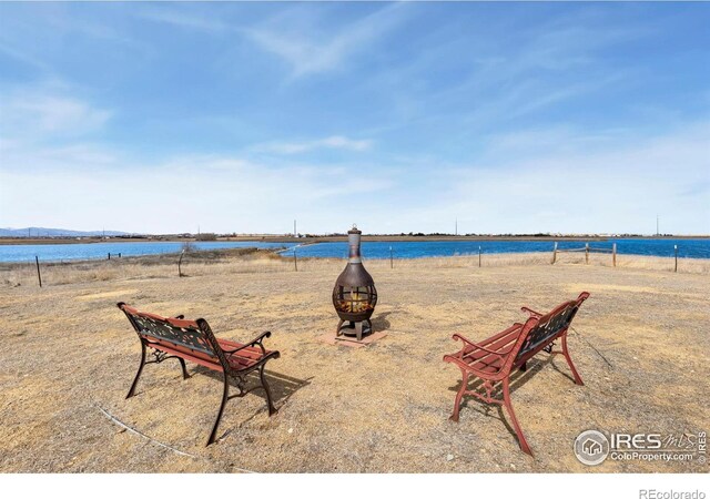 water view featuring a fire pit